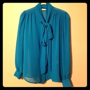 Sheer button down teal blouse with tie accent